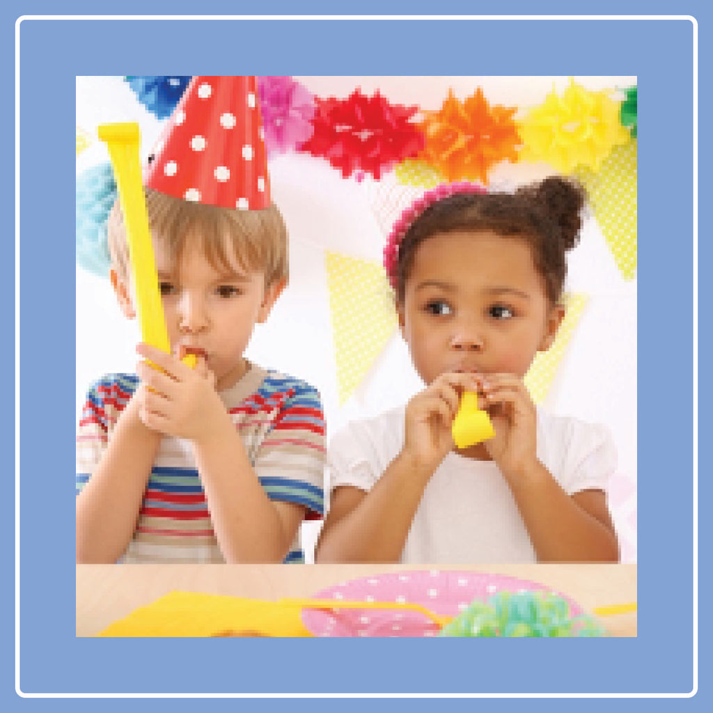 two children celebrating a birthday