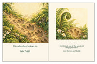 Personalized name and dedication pages for Michael, with dinosaur footprints and a gift message from Mommy and Daddy.